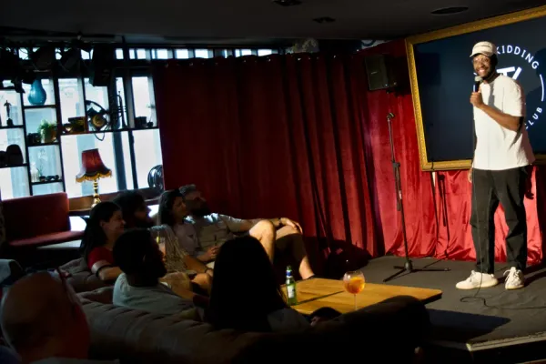 Comedian performing at a JK Comedy Club show