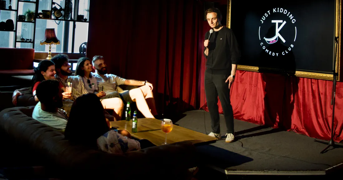 Packed Friday night audience laughing at JK Comedy Club Leicester Square