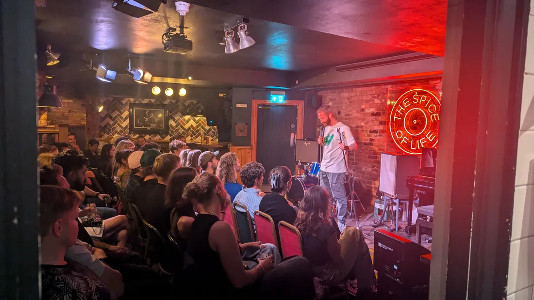 Full room of comedy fans on a Wednesday night at JK Comedy Club Soho